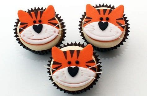 Tiger cupcakes | Tiger cupcakes, Animal cupcakes, Tiger cake