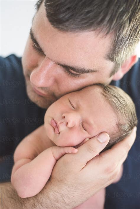 Father Hugging His Baby By Stocksy Contributor Lea Csontos Stocksy