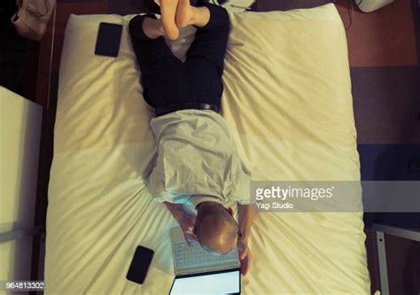 Business Man Sleeping In Hotel Bed Photos And Premium High Res Pictures