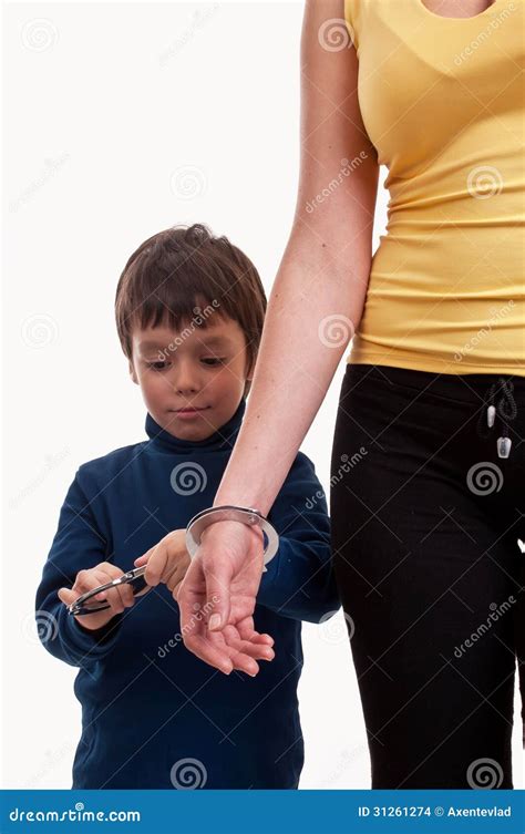 Mother And Son Playing Cops And Robbers Chained W Stock Photo Image Of Hands Imagin
