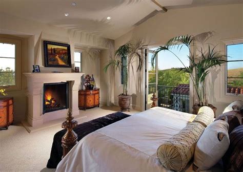 Traditional Luxury Master Bedroom With Fireplace Facing Bed Luxury