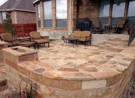 While installing it by yourself can be a hard work, calling professional to do the job will. Oklahoma Flagstone with Seat Wall - GREENSCAPES LANDSCAPING, ATX | Stone patio designs, Patio ...