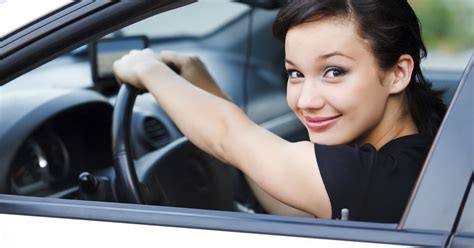 Top Cars For New Drivers Woman Driver Holding Car Keys Driving Her New Car By Insurance
