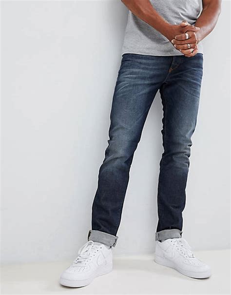 Diesel Buster Regular Slim Fit Jeans In 084zu Mid Wash Asos