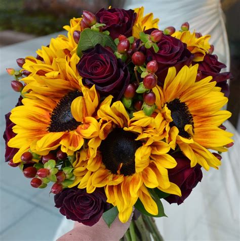 As the kind of flowers has a meaning, the number of roses sent also communicates a special message. Fall Sunflowers and Rose Wedding Bouquets