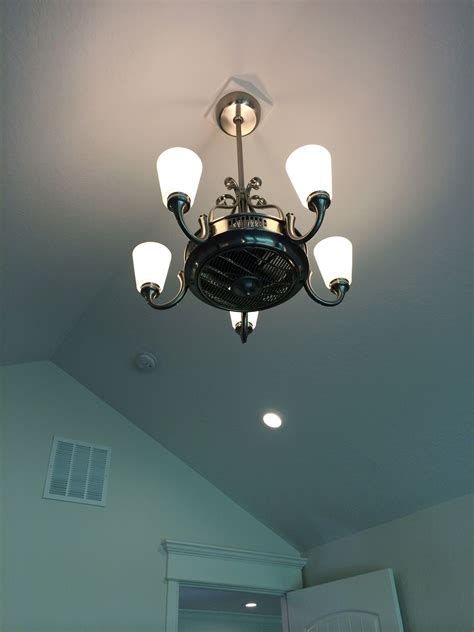 A thoughtfully placed caged ceiling fan will really make a statement while providing a cool breeze when cooking or dining. very cool ceiling fan. Need to find this! (With images ...