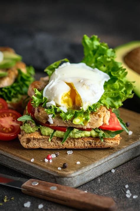 Delicious Sandwich With Avocado And Poached Egg Stock Image Image Of