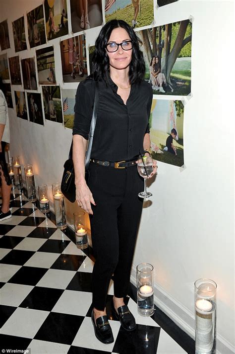 Courteney Cox Takes It Back To Basics In Black Shirt And Tailored