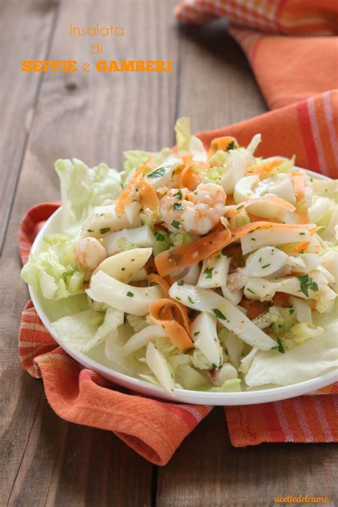 Servire su un tavolo di festa. Insalata di seppie e gamberi, sfiziosa ed invitante ...