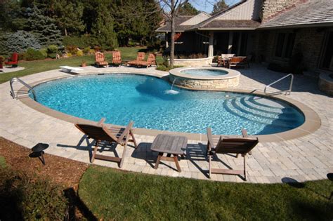 Northbrook Il Freeform Pool With Round Elevated Hot Tub Traditional