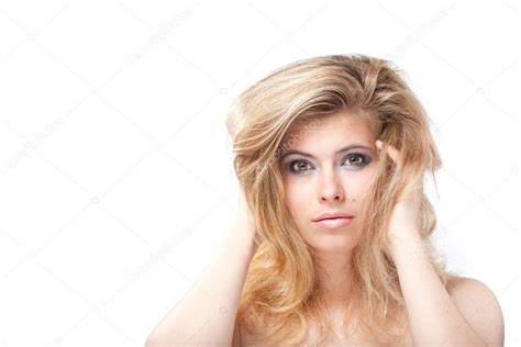 Tempting Blonde Young Woman With Large Grey Eyes Holding