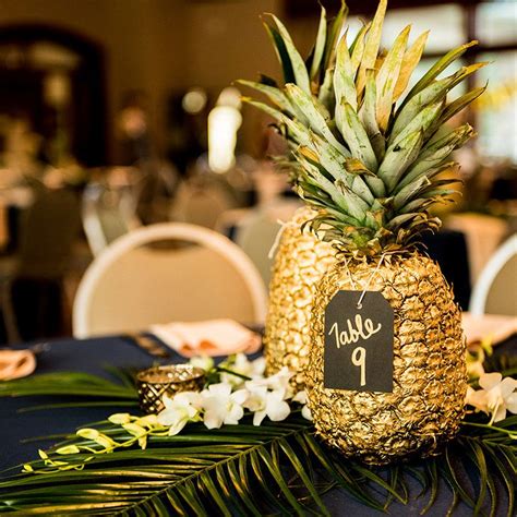 Reception Table Decor Gold Pineapple Centerpieces Palm Fronds Gold Navy And Green Wedding