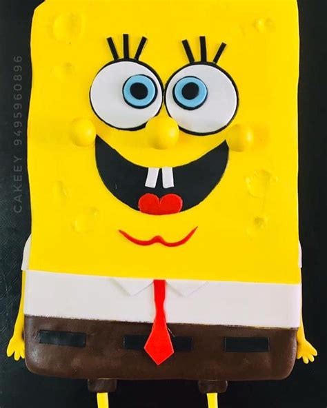 A Sponge Bob Themed Whipped Cream Frosted Cake For An Ultimate Bob