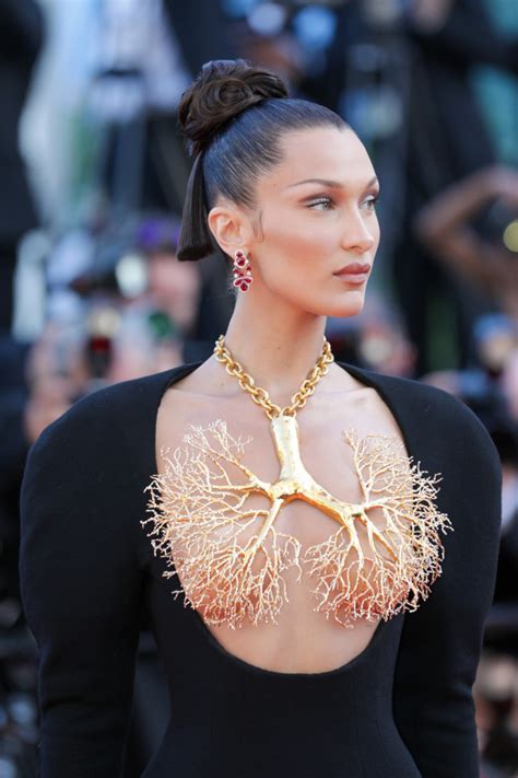 Bella Hadid Covers Breasts With Stunning Golden Lungs Necklace By