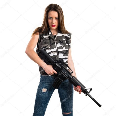 Young Girl Holding A Rifle Stock Photo By ©luismolinero 111108406