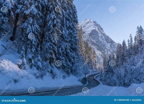 Road To Snowy Mountain In Austrian Alps Stock Photo Image Of Blizzard