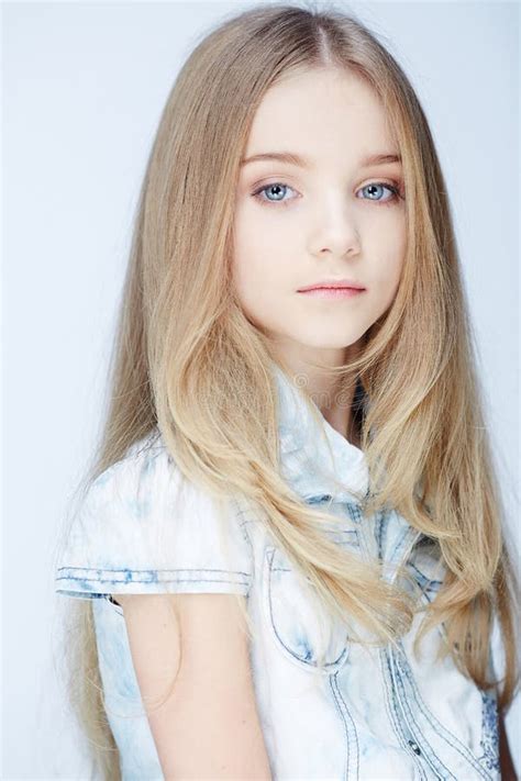 Portrait Of Young Blond Girl With Blue Eyes Stock Photo Image Of