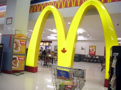 To download, go to google play or apple app store and search for mcdonald's or simply scan the qr code. The McDonald's inside of the Lincoln Fields Wal-Mart. | Flickr