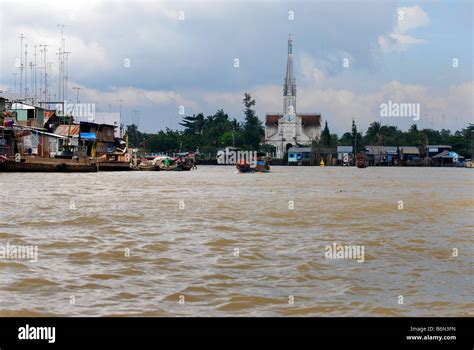 The River Catholic Church And Town Of Cai Be Mekong Delta Vietnam