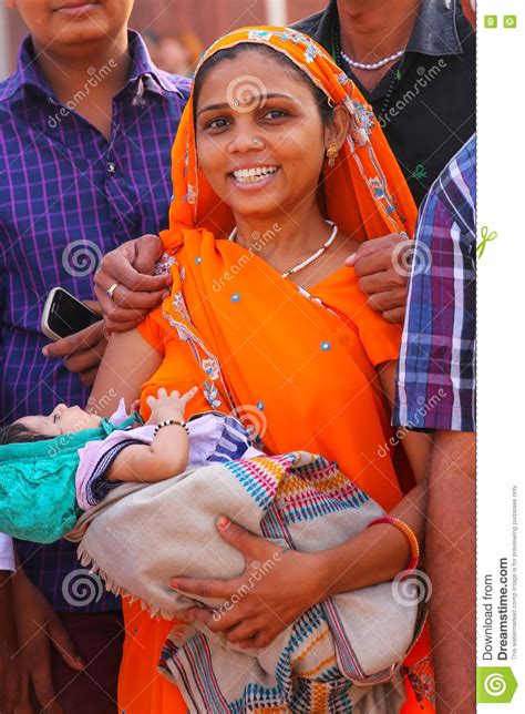 Young Woman With A Baby Standing In Agra Fort Uttar Pradesh In