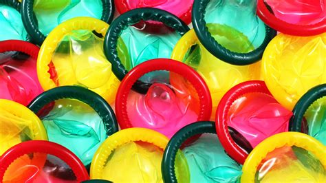A Close Up Image Of A Multitude Of Colored Condoms X WEB Clinique CME