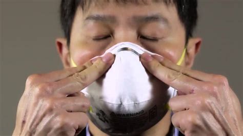 When a cloth mask was worn on top of a surgical mask, about 80% were blocked. How to Wear a 3M™ N95 8210 Respirator - YouTube