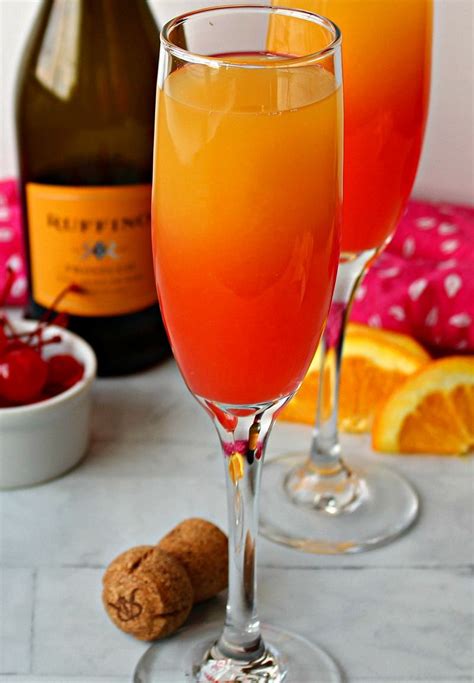 sunrise mimosa ~ orange juice prosecco grenadine ~ a gouda life recipe prosecco and orange