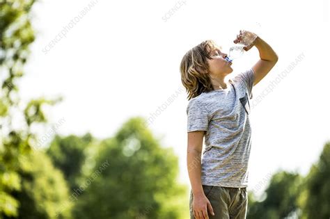 Boy Drinking Water Stock Image F0226895 Science Photo Library