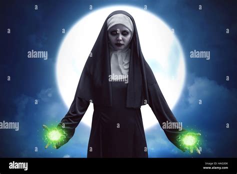 Demon Nun Asian Woman Get Green Spell Strength On The Moonlight Stock