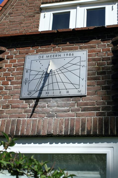 Muurzonnewijzer In De Tuin Uw Zonnewijzer Op Maat