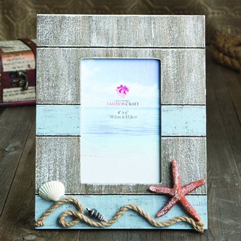 Golden wedding ring in vintage gold picture frame on sand beach many colorful empty picture frame hanging or isolated on black rough black wall for decoration festival, event or wedding party in. Shop Nautical Beach Theme Picture Frame - Free Shipping On ...