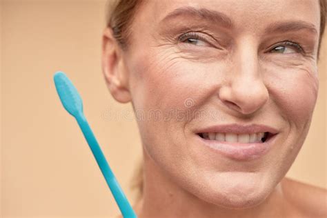 Smiling Mature Woman Going To Brush Her Teeth Stock Image Image Of Care Clinic 202723103
