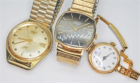 A Group Of Three Wristwatches Comprising A Gold Plated Longines Ultra