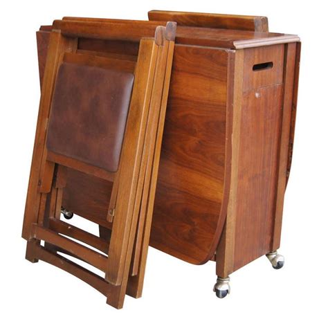 You don't have to store the extension leaves in separate places, because the extension leaves simply fold in together with the table. Vintage 68" Wood Folding Dining Table with Four Chairs Set ...