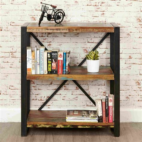 The black metal frame merges with rustic brown elements, and 3 open shelves combines with 4 fabric drawers, making the whole piece of furniture full of industrial style with storage to boot. Aspen Reclaimed Wood Industrial small Bookshelf Book case