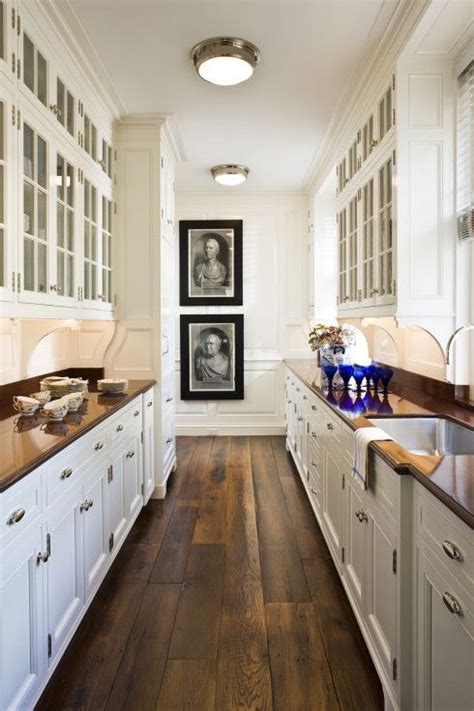 Galley kitchen a full kitchen in which there are two sides, and one would walk through the center a kitchen design that consists of two parallel counters, one with two of the three work triangle appliances and the other with one. A Design Favorite: The Butler's Pantry | Galley kitchen ...