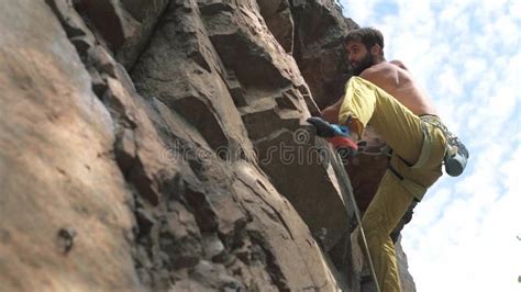 Slow Motion Climbing Moments And Details Closeup Athletic Man Rock Climber With Naked Torso