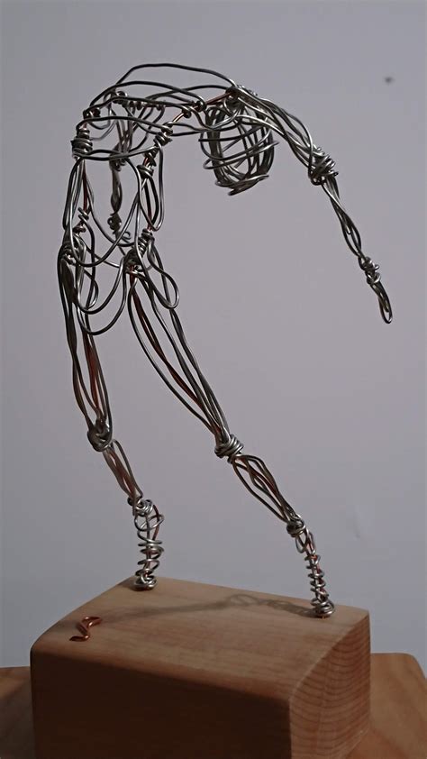 Capturing The Physicality And Emotion Of The Figure This Wire Sculpture Is Created From Copper