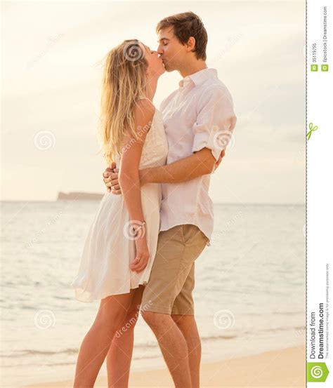 Happy Romantic Couple On The Beach At Sunset Stock Image Image Of