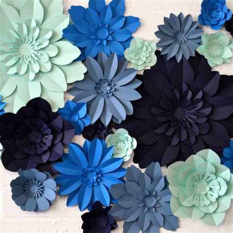 Then, whip up some wall art or create a fancy gift box with one of these four floral projects. Handmade Four Colour Paper Flower Wall Display By May Contain Glitter | notonthehighstreet.com