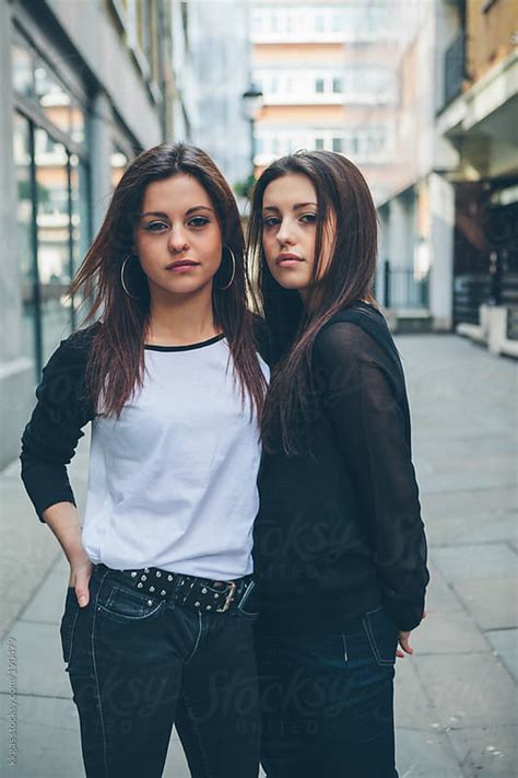 Twin Teenage Girls Outdoors In London By Kkgas Stocksy United