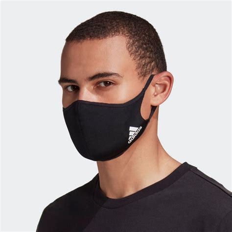 Choose your favorite nike face masks from thousands of available designs. adidas Launches All-Black Washable Face Mask | DA MAN Magazine