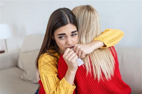 Premium Photo Woman Hugging Her Depressed Friend At Home Closeup