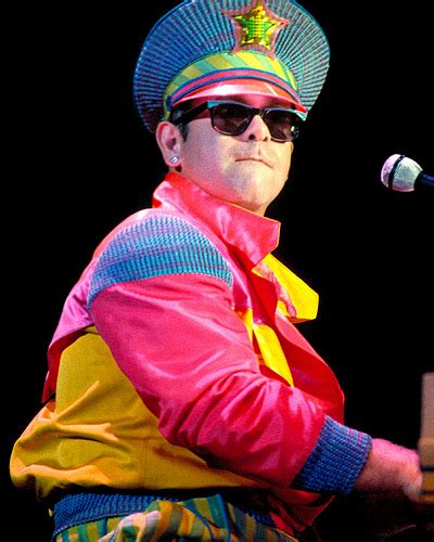 His professional stage costumer was annie reavey, who designed a dozen outfits for his tours of the us and uk the same year. elton john´s pics: Photos: Elton John's Outfits Through ...