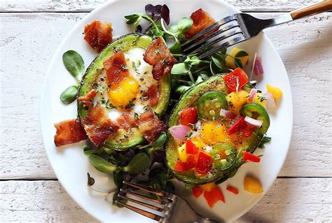 Use up an abundance of eggs in delicious ways. How to Bake Eggs In Avocados - Paleo Recipe | Paleo Newbie