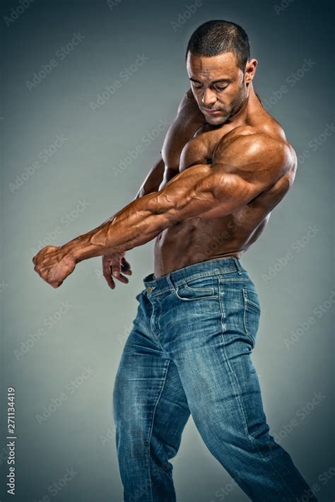Shirtless Muscular Men In Jeans Stock Photo Adobe Stock