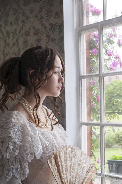 Victorian Woman Looking Out Of The Window Photograph By