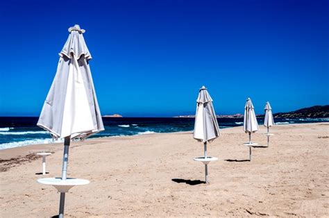 Premium Photo Rows Of Umbrellas On The Beach