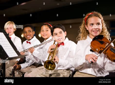 Children Playing Musical Instruments In Band Stock Photo Alamy