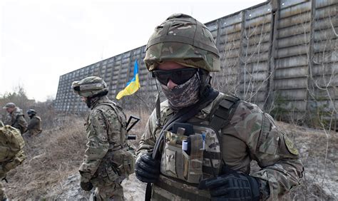 Ukraine's Territorial Defense volunteers prepare to support army in ...